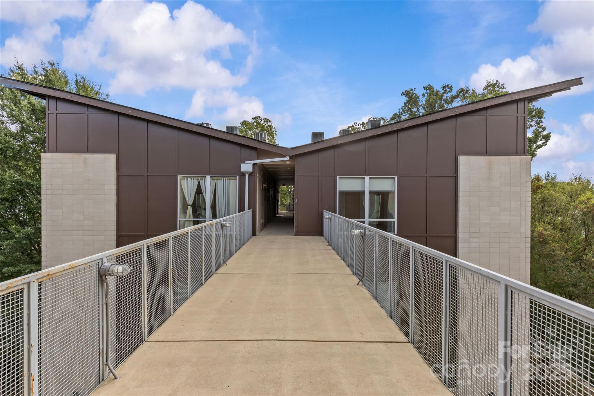 2116 McClintock Road, Unit 232 Charlotte, NC 28205 - Photo 42 of 48 a view of a house with wooden fence
