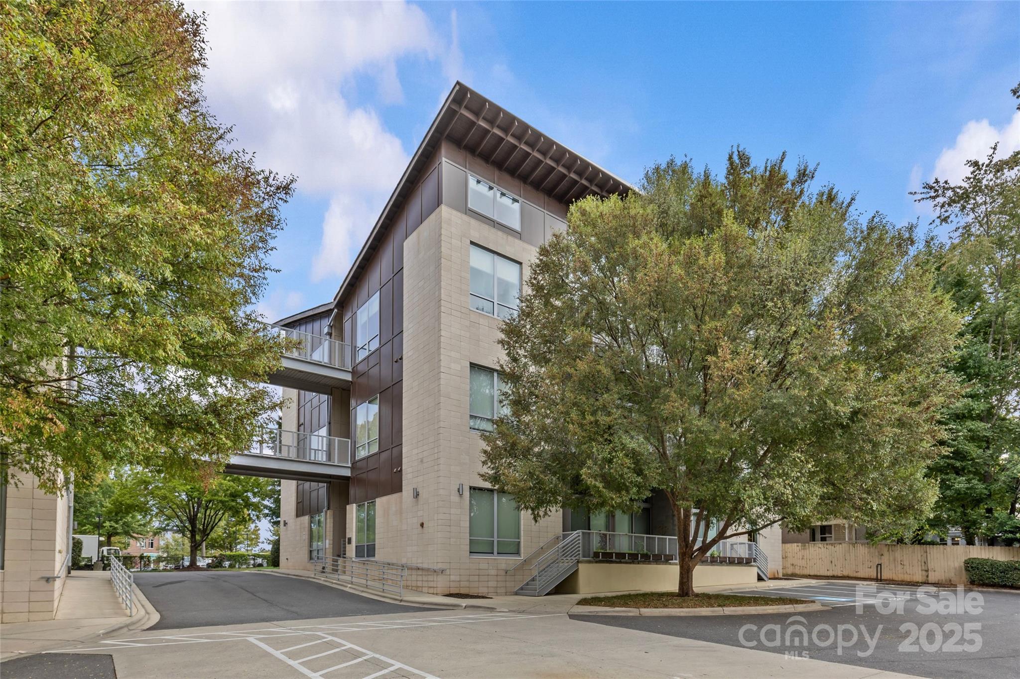 2116 McClintock Road, Unit 232 Charlotte, NC 28205 - Photo 46 of 48 a front view of a house with a yard