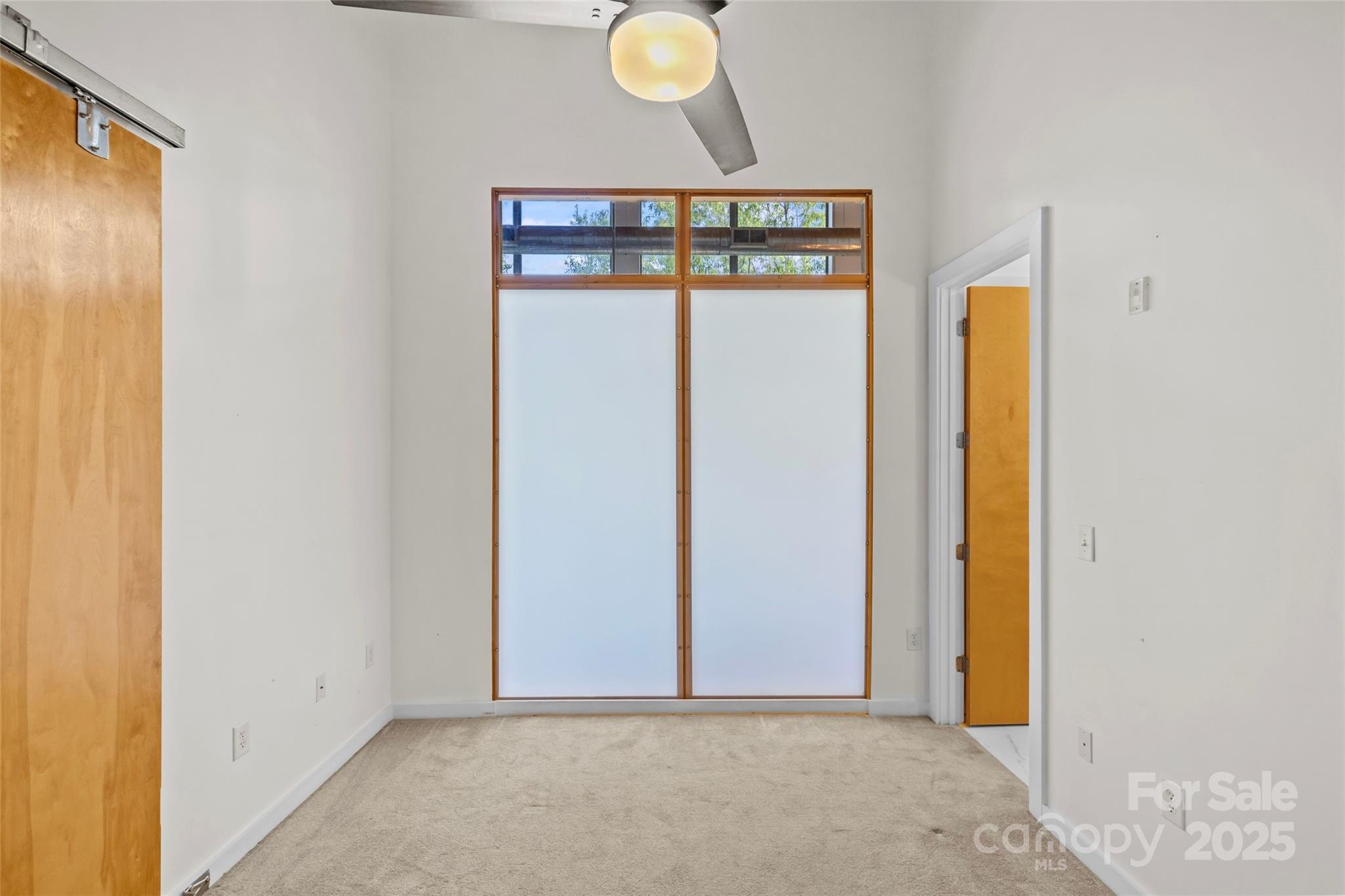 2116 McClintock Road, Unit 232 Charlotte, NC 28205 - Photo 6 of 48 a view of a hallway