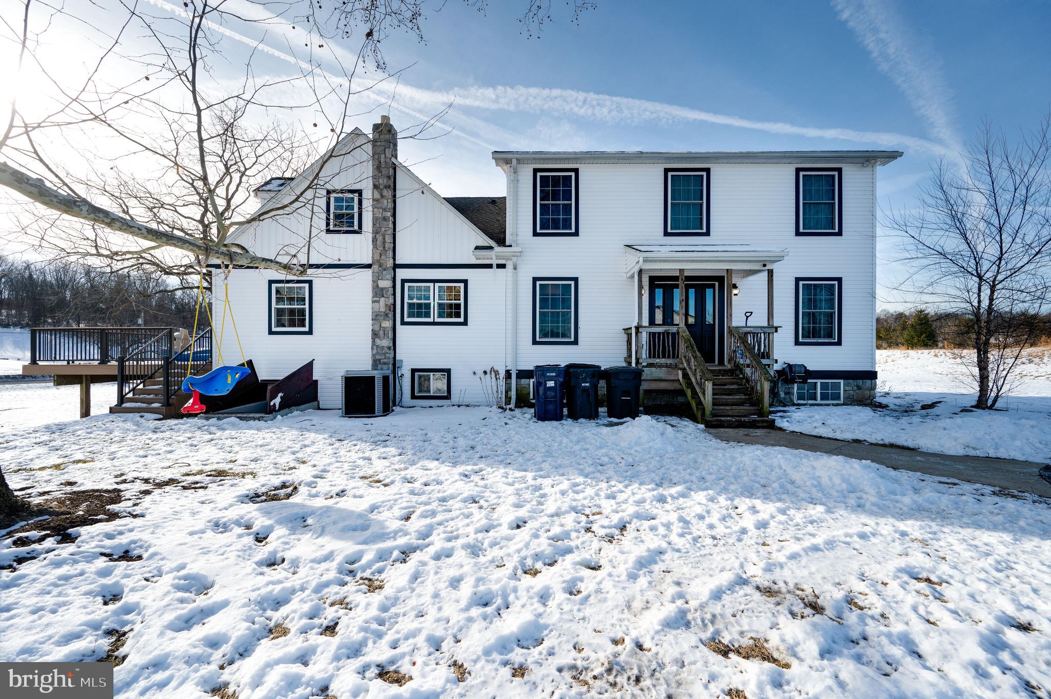 1109 Upper Van Reed Road Leesport, PA 19533 - Photo 15 of 72 a street view along a residential apartment building with a yard