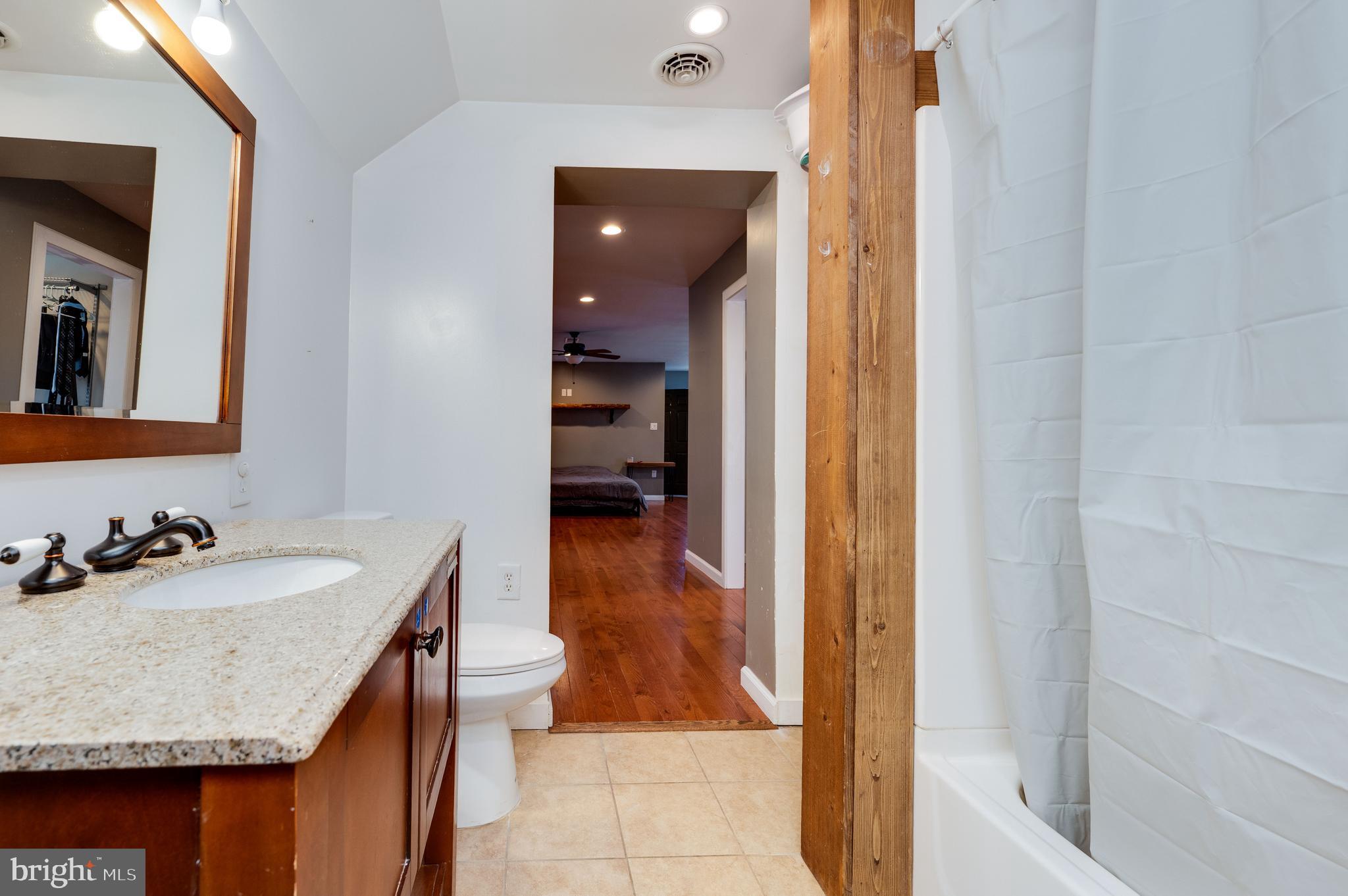 1109 Upper Van Reed Road Leesport, PA 19533 - Photo 57 of 72 a bathroom with a sink a toilet and shower