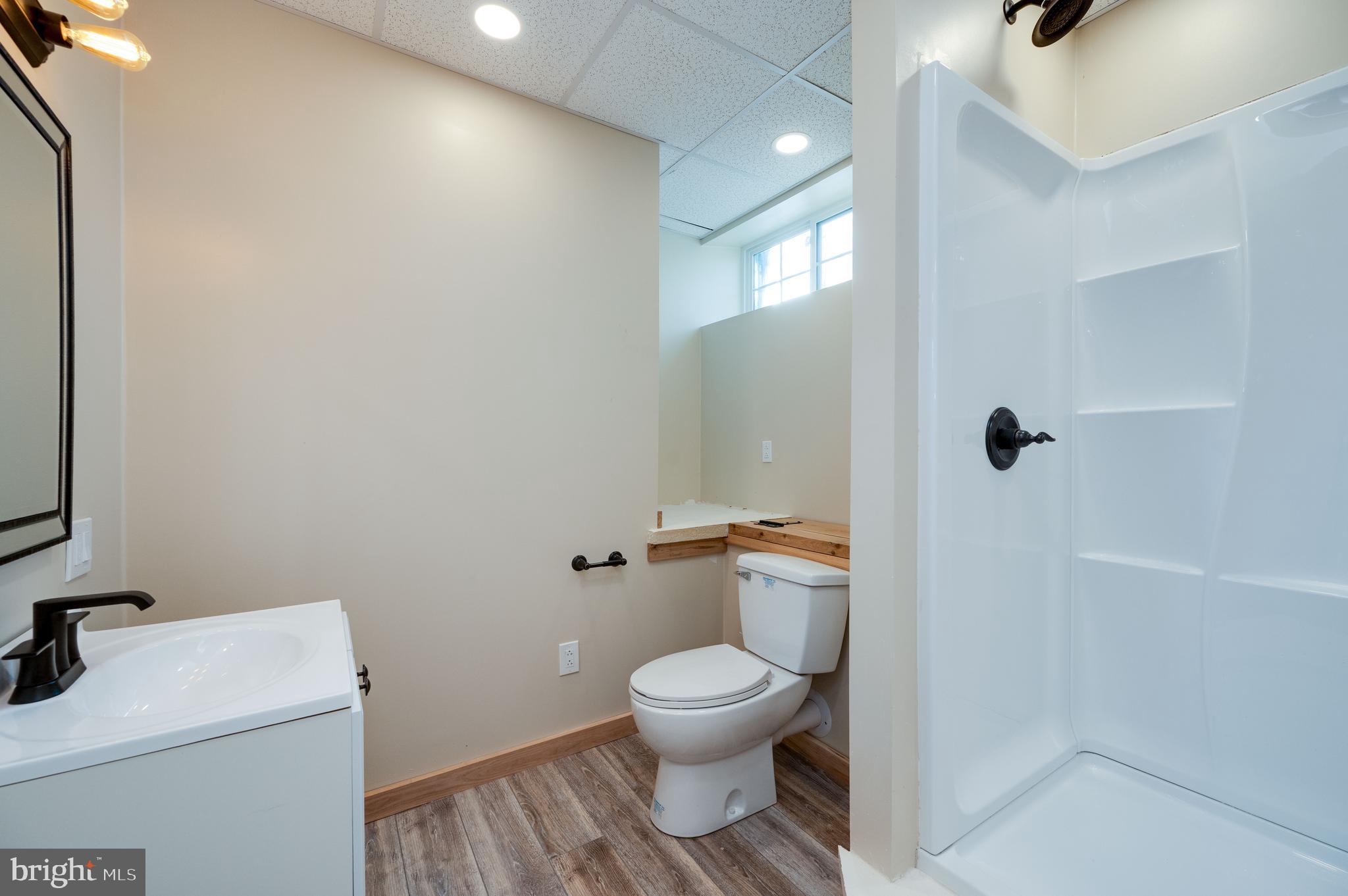 1109 Upper Van Reed Road Leesport, PA 19533 - Photo 66 of 72 a bathroom with a toilet a sink and shower