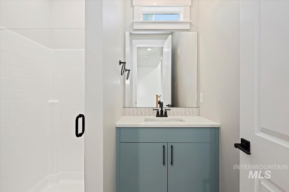 404 Hidden Mill Middleton, ID 83644 - Photo 17 of 41 Bathroom with vanity and a stall shower