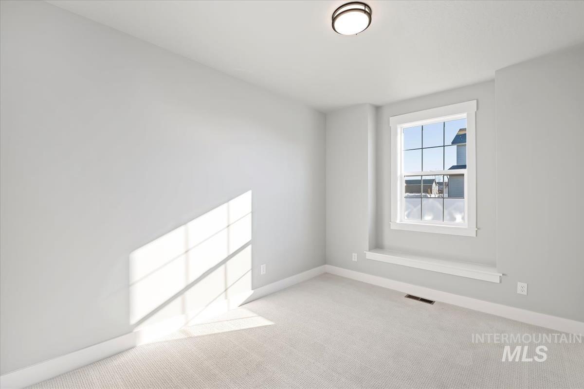 404 Hidden Mill Middleton, ID 83644 - Photo 18 of 41 Unfurnished room with carpet floors and baseboards