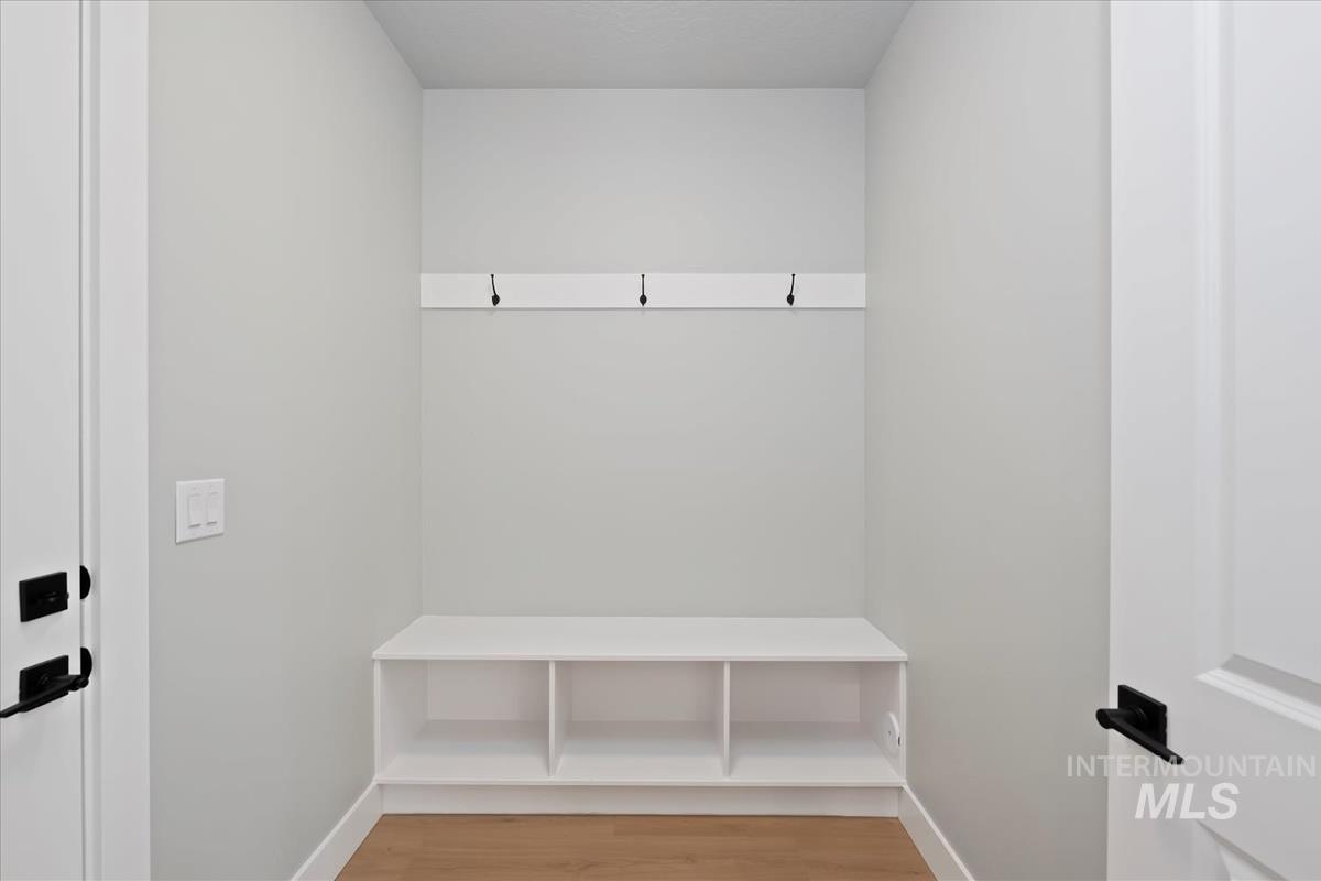 404 Hidden Mill Middleton, ID 83644 - Photo 35 of 41 Mudroom featuring light wood finished floors and baseboards
