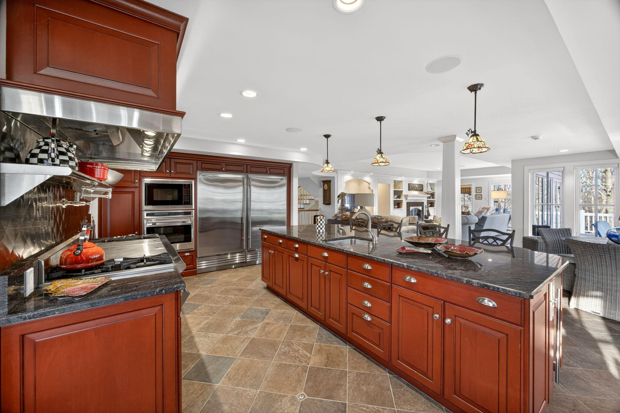 35 Northgate Road North Chatham, MA 02650 - Photo 24 of 75 a room with stainless steel appliances kitchen island granite countertop a sink and cabinets