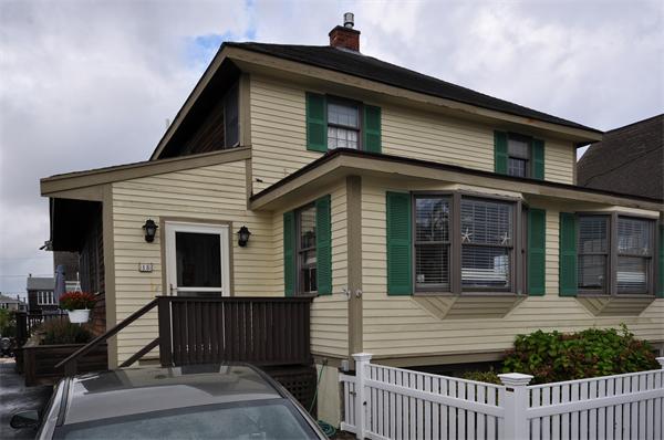18 Olympia Road Marshfield, MA 02050 - Photo 1 of 30 a front view of a house with a porch