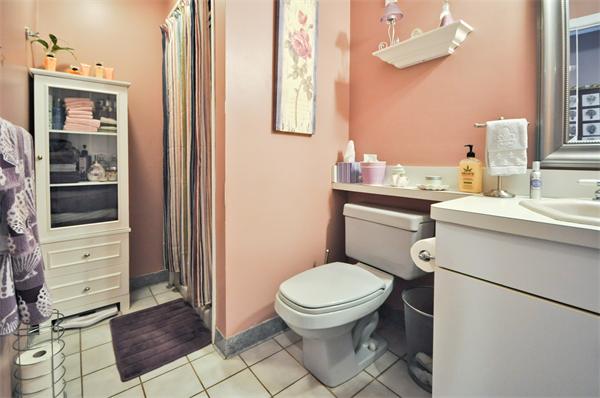 18 Olympia Road Marshfield, MA 02050 - Photo 17 of 30 a bathroom with a toilet a sink and a mirror