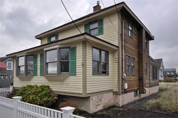 18 Olympia Road Marshfield, MA 02050 - Photo 2 of 30 a front view of a house with a yard