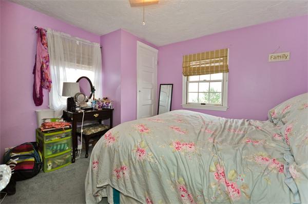 18 Olympia Road Marshfield, MA 02050 - Photo 21 of 30 a bedroom with a bed and a dresser