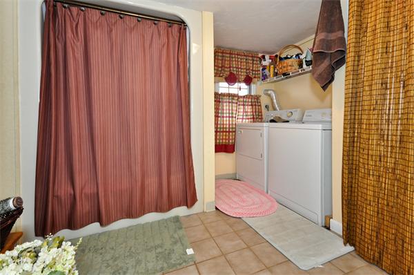 18 Olympia Road Marshfield, MA 02050 - Photo 23 of 30 a bathroom with a sink and toilet