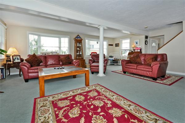 18 Olympia Road Marshfield, MA 02050 - Photo 4 of 30 a living room with furniture and a rug