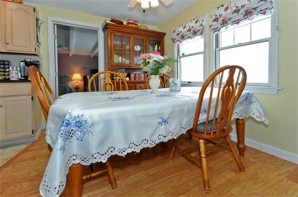 18 Olympia Road Marshfield, MA 02050 - Photo 8 of 30 a view of a dining room with furniture window and wooden floor