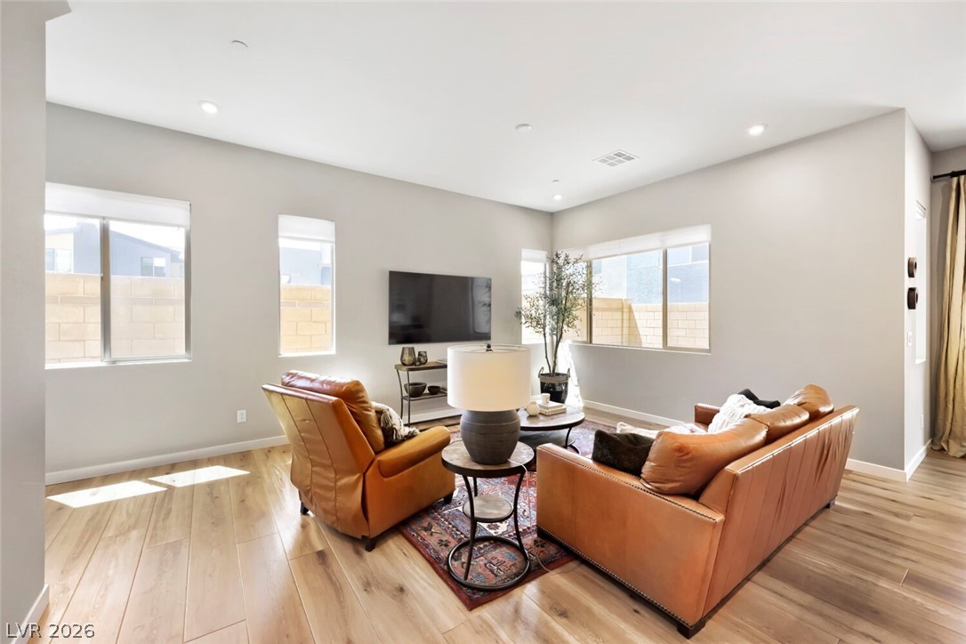 3360 Via Strada Street Henderson, NV 89044 - Photo 8 of 28 Spacious Living Room with Great Natural Light