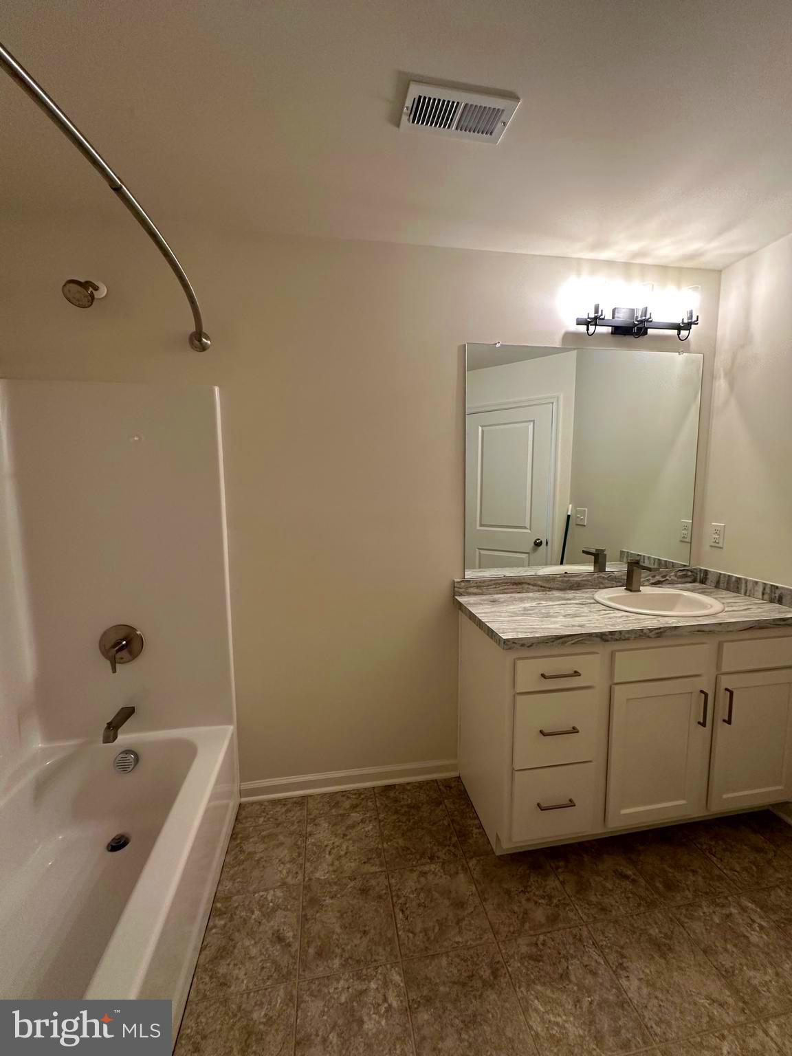 78 Tansboro Road Berlin, NJ 08009 - Photo 14 of 22 a bathroom with a tub sink double vanity granite and a tub