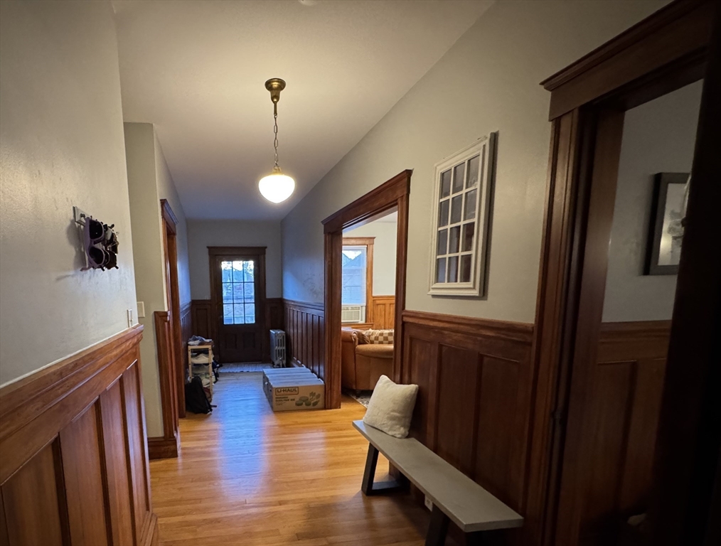 10-12 Ashcroft Street, Unit 2 Boston, MA 02130 - Photo 10 of 12 a view of a livingroom with furniture hardwood floor and a ceiling fan