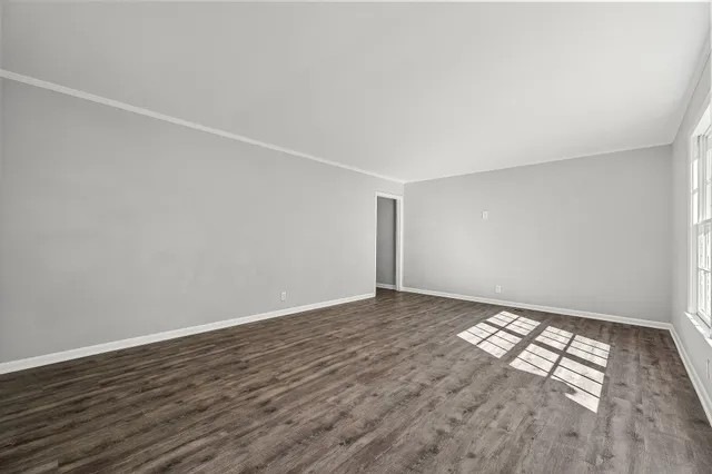 a view of an empty room and window