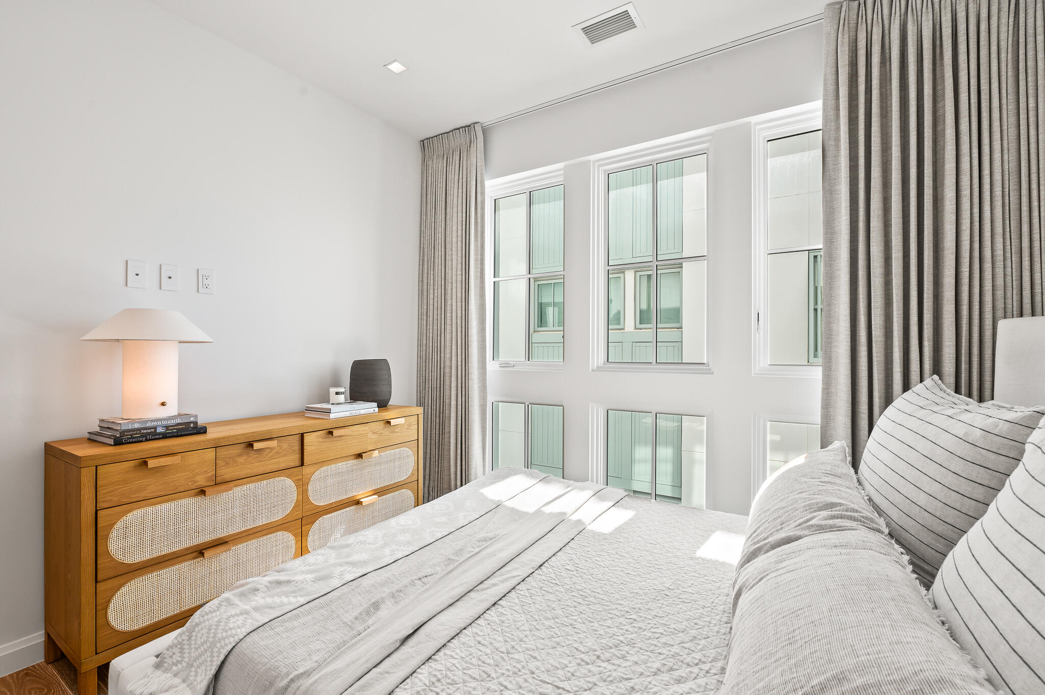 74 Governors Ct Inlet Beach, Unit W301 Inlet Beach, FL 32461 - Photo 24 of 70 a bedroom with a bed and wooden floor