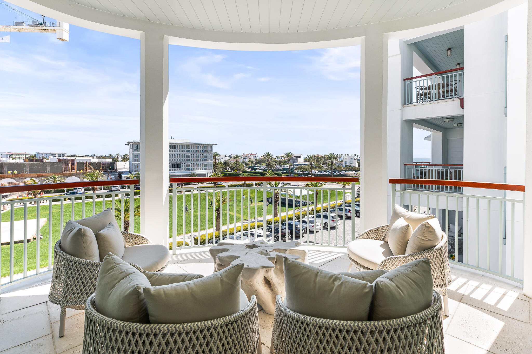 74 Governors Ct Inlet Beach, Unit W301 Inlet Beach, FL 32461 - Photo 37 of 70 a balcony with furniture and a floor to ceiling window