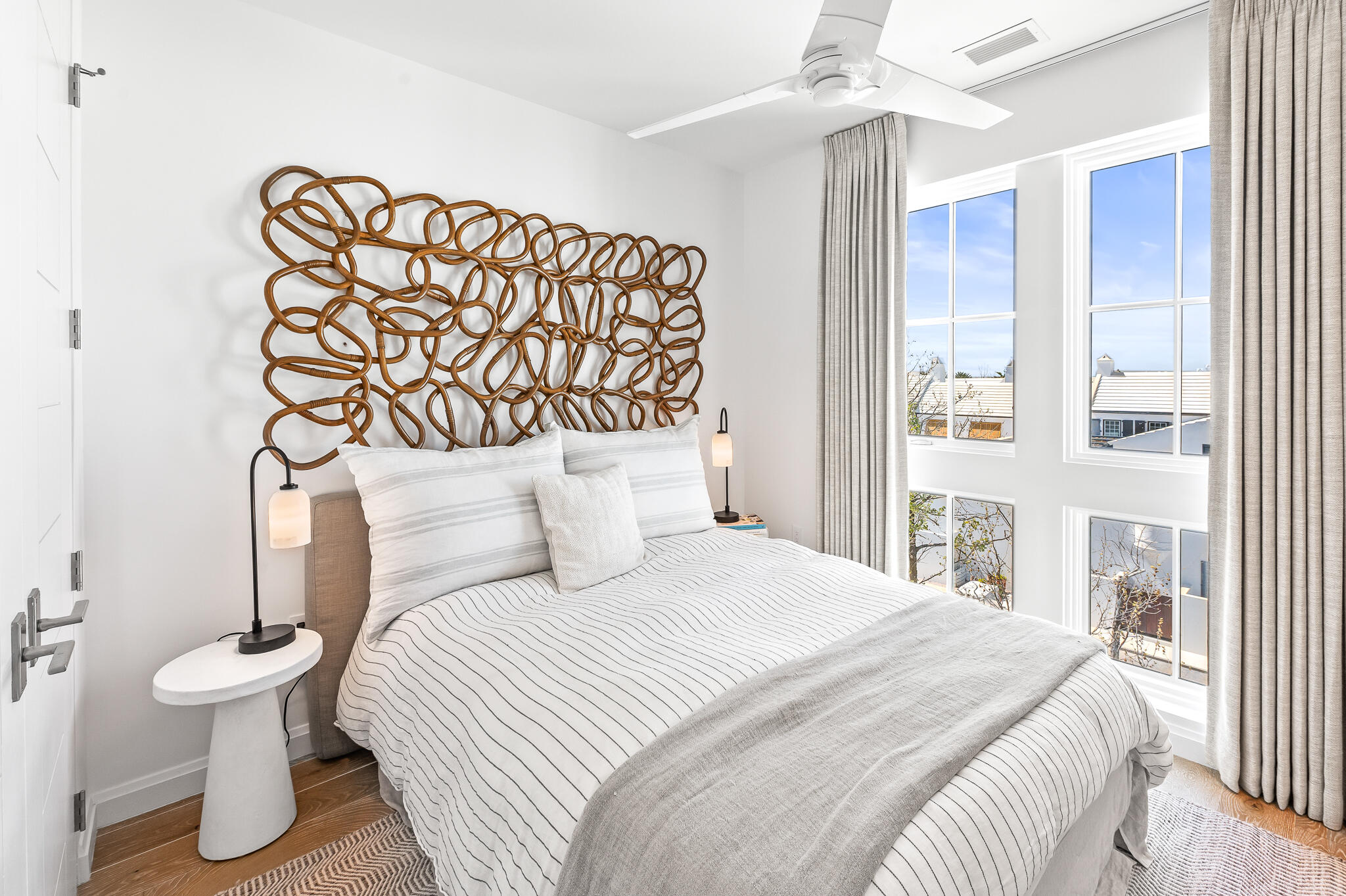 74 Governors Ct Inlet Beach, Unit W301 Inlet Beach, FL 32461 - Photo 9 of 70 a bedroom with a bed and a painting on the wall