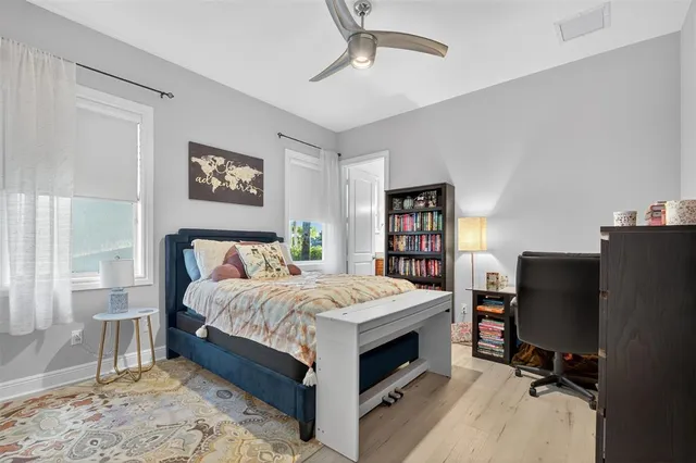 an aerial view of residential house with outdoor space and swimming pool