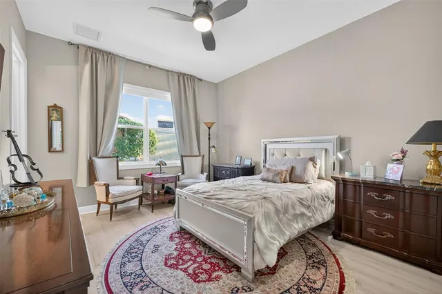 an aerial view of residential houses with outdoor space and street view