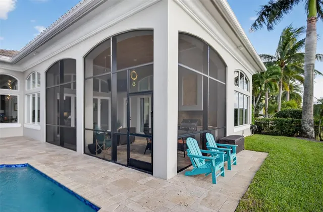 a bathroom with a granite countertop shower a sink and a bathtub