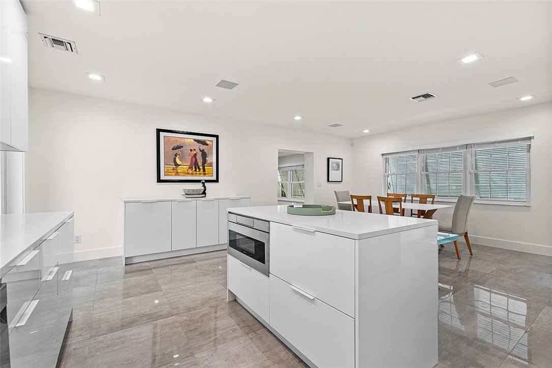 774 Azalea Lane Vero Beach, FL 32963 - Photo 12 of 34 a living room with furniture and a table