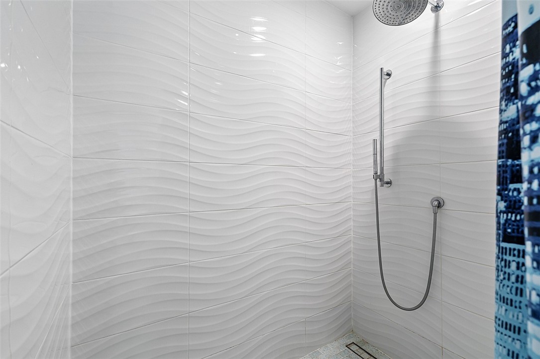 774 Azalea Lane Vero Beach, FL 32963 - Photo 16 of 34 a bathroom with a shower