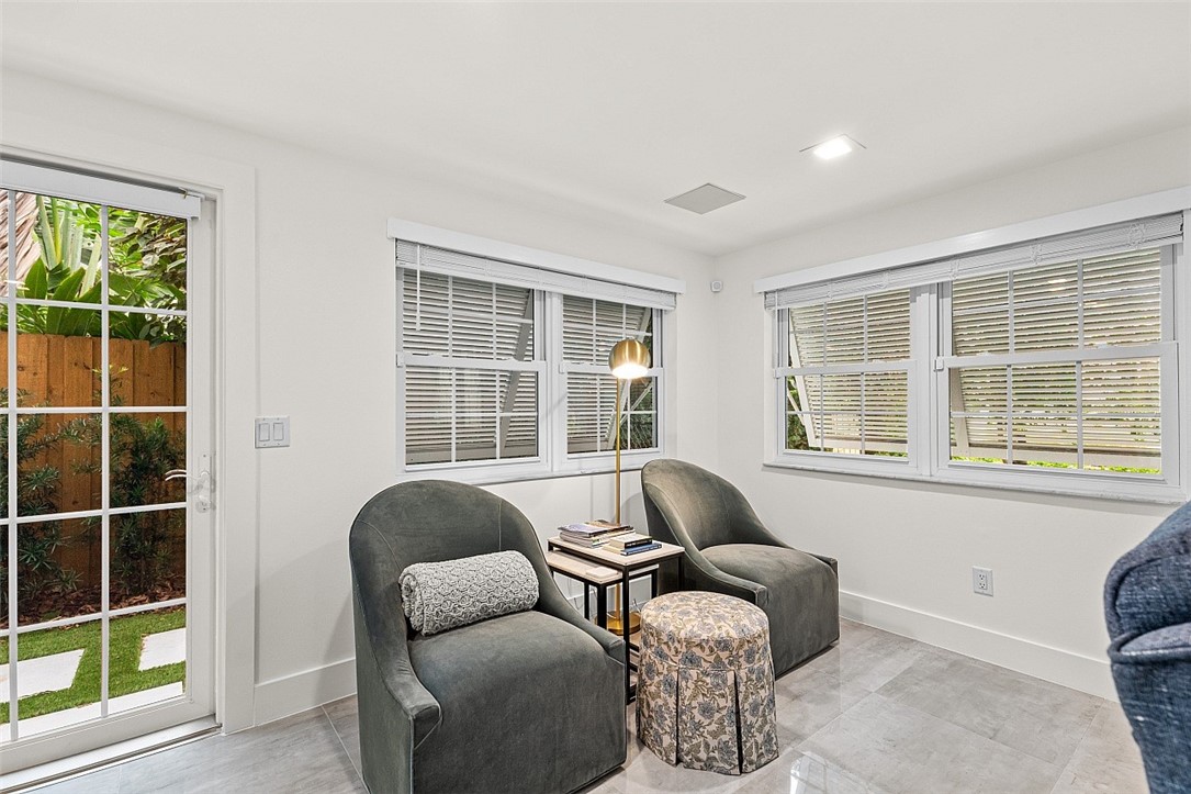 774 Azalea Lane Vero Beach, FL 32963 - Photo 7 of 34 a living room with furniture and a window