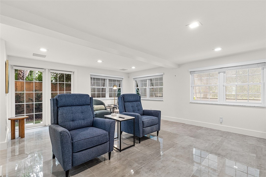 774 Azalea Lane Vero Beach, FL 32963 - Photo 9 of 34 a living room with furniture and a window
