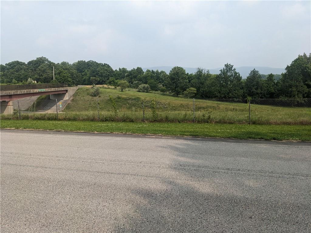 0 Raymond Franks Road Smithfield, PA 15478 - Photo 14 of 16 a view of a green field with trees in the background