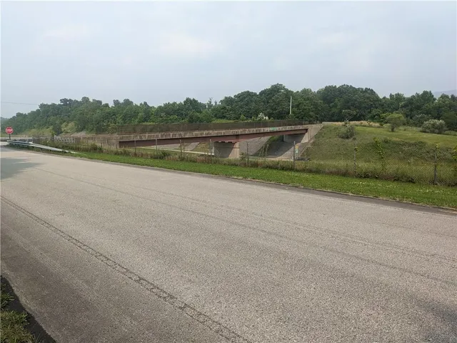 a view of lake with mountain in the background