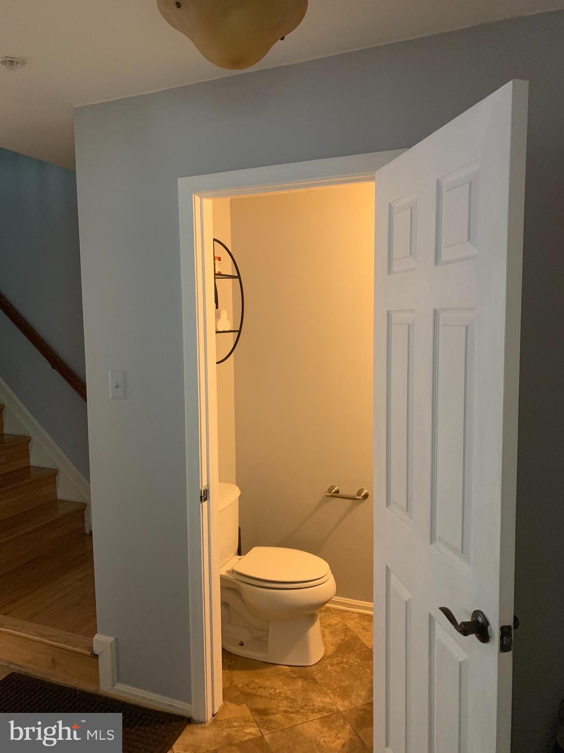 8538 Ritchboro Road District Heights, MD 20747 - Photo 4 of 19 1st level powder room