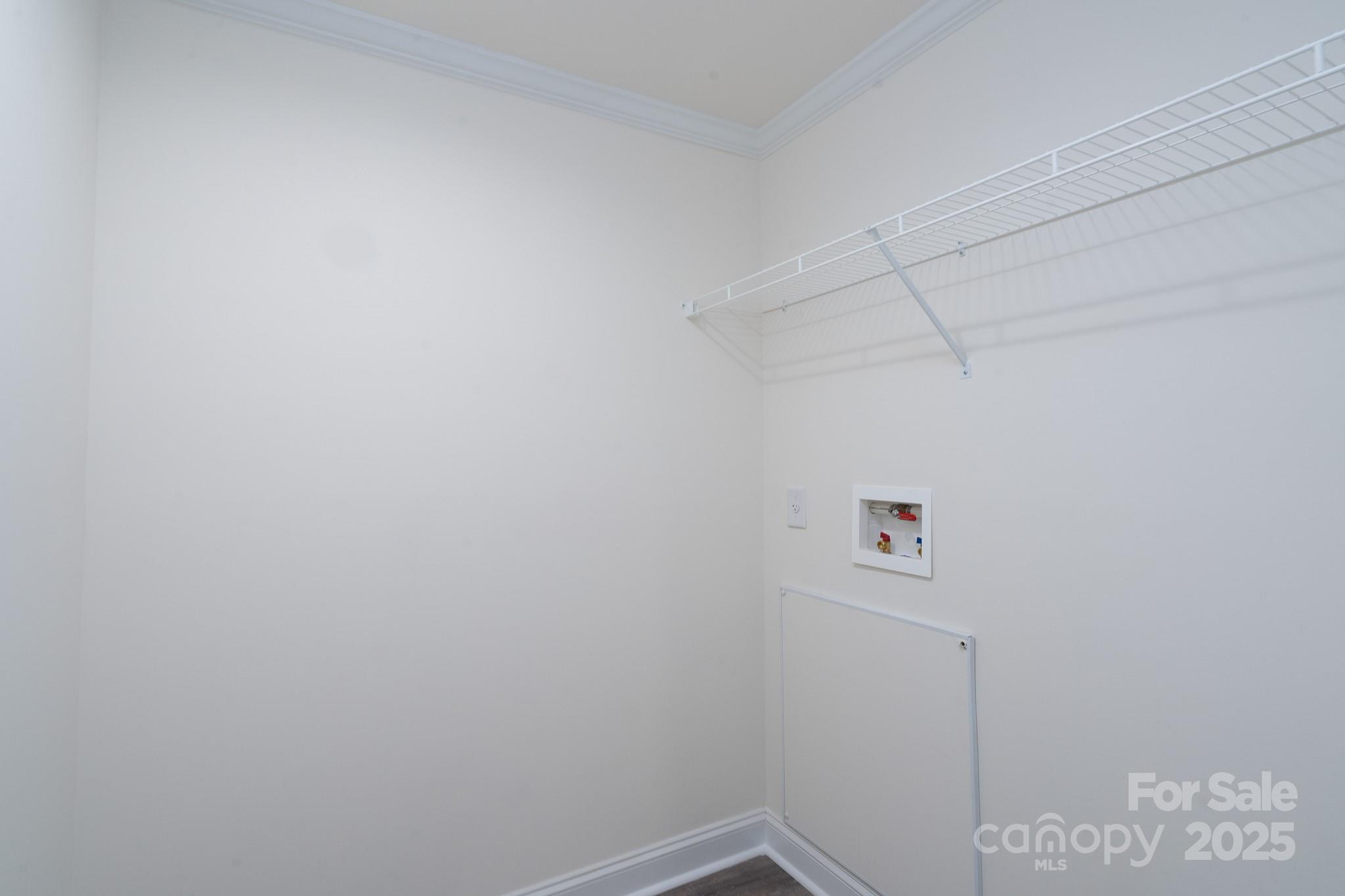 6205 Faith Road Salisbury, NC 28146 - Photo 24 of 33 a view of a room with racks on the wall