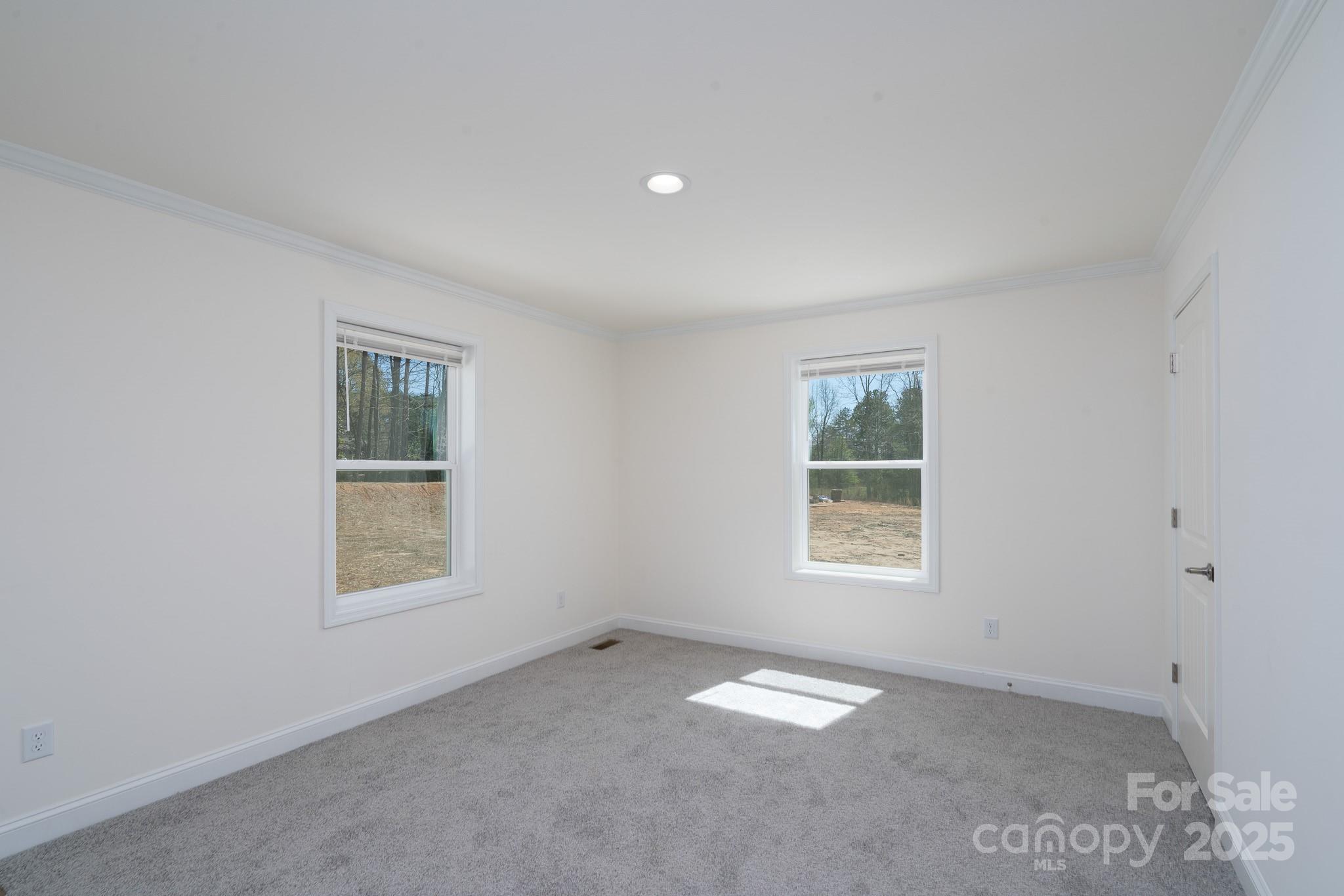 6205 Faith Road Salisbury, NC 28146 - Photo 25 of 33 an empty room with a window