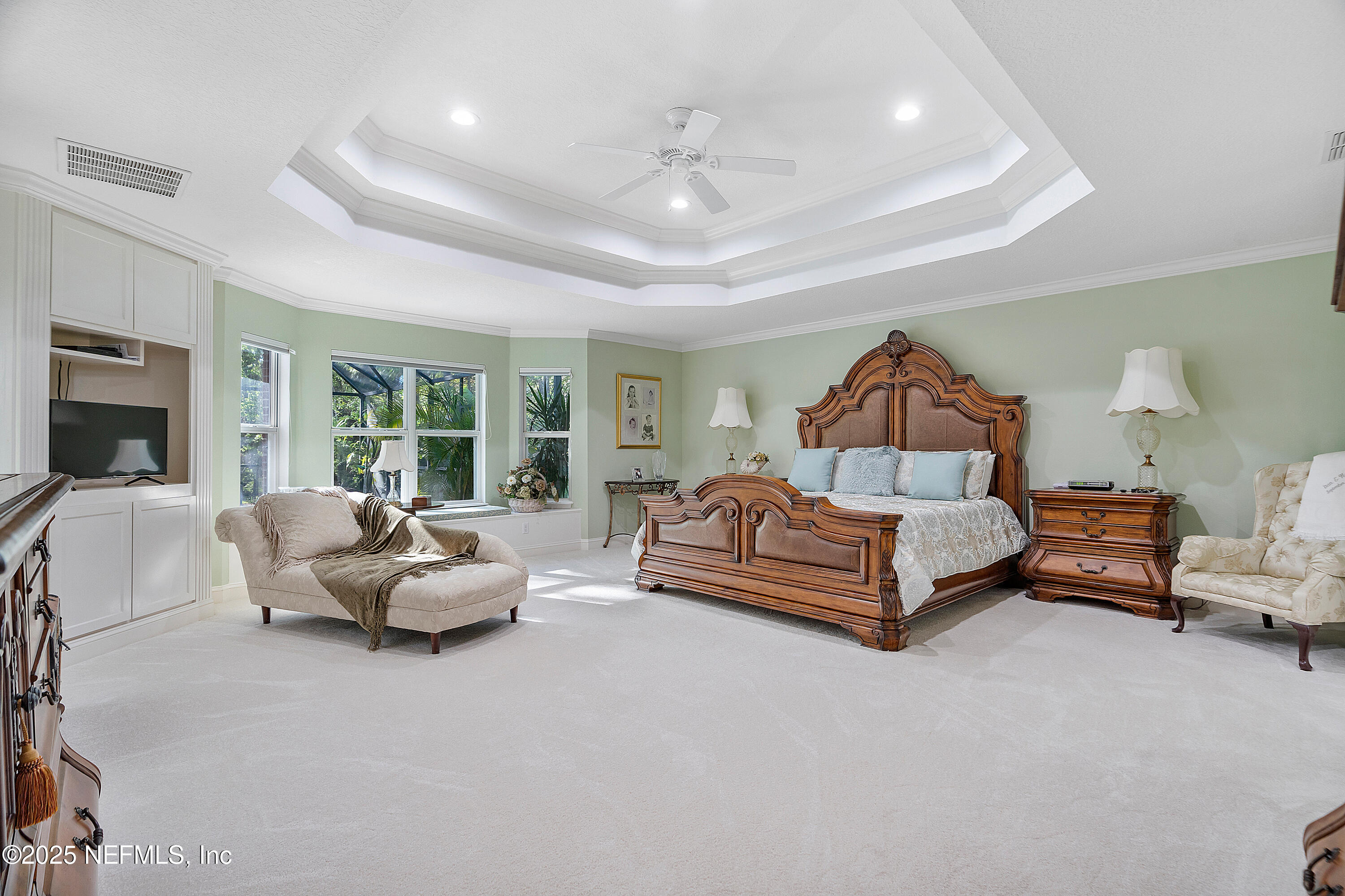 2688 Seneca Drive St. Johns, FL 32259 - Photo 20 of 62 a bedroom with furniture and a large window