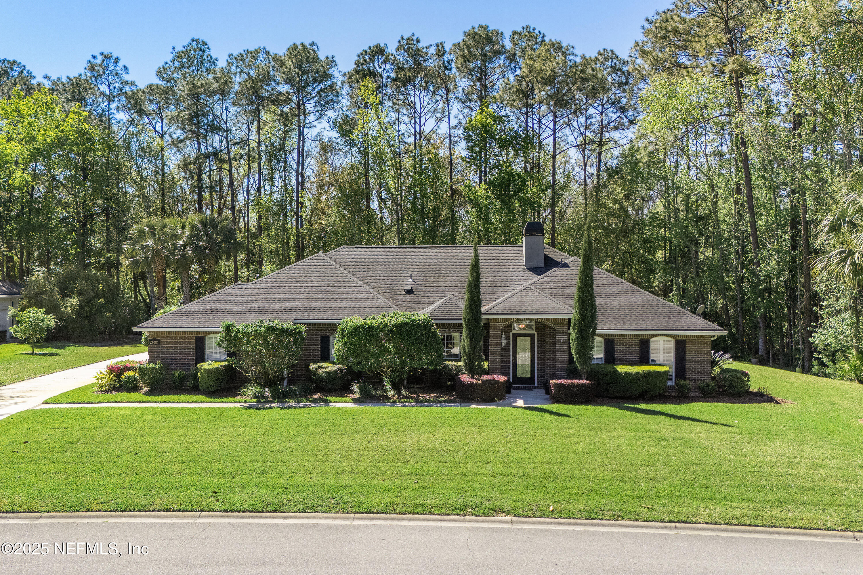 2688 Seneca Drive St. Johns, FL 32259 - Photo 2 of 62 a front view of a house with a garden