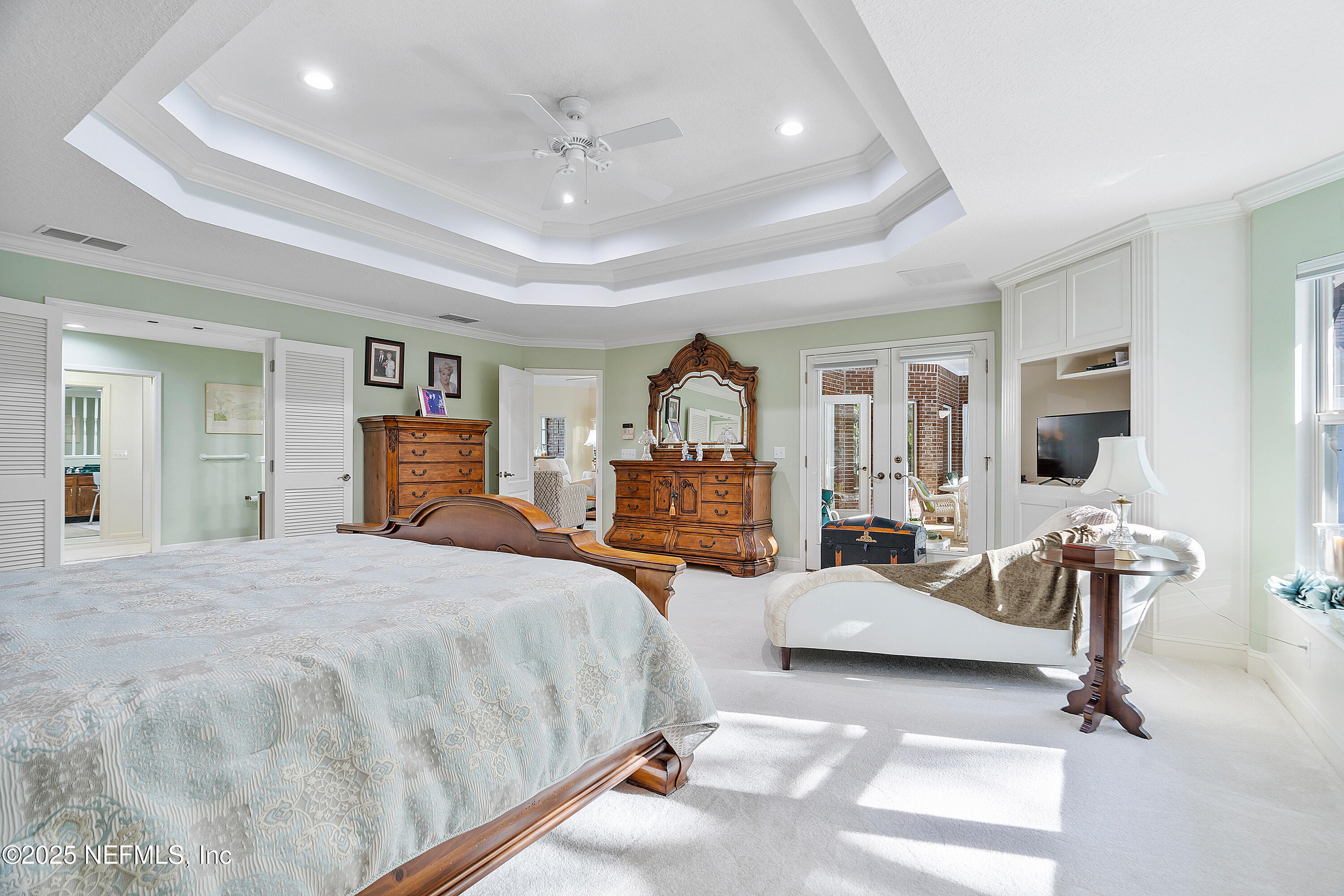 2688 Seneca Drive St. Johns, FL 32259 - Photo 22 of 62 a spacious bedroom with a bed couch and window