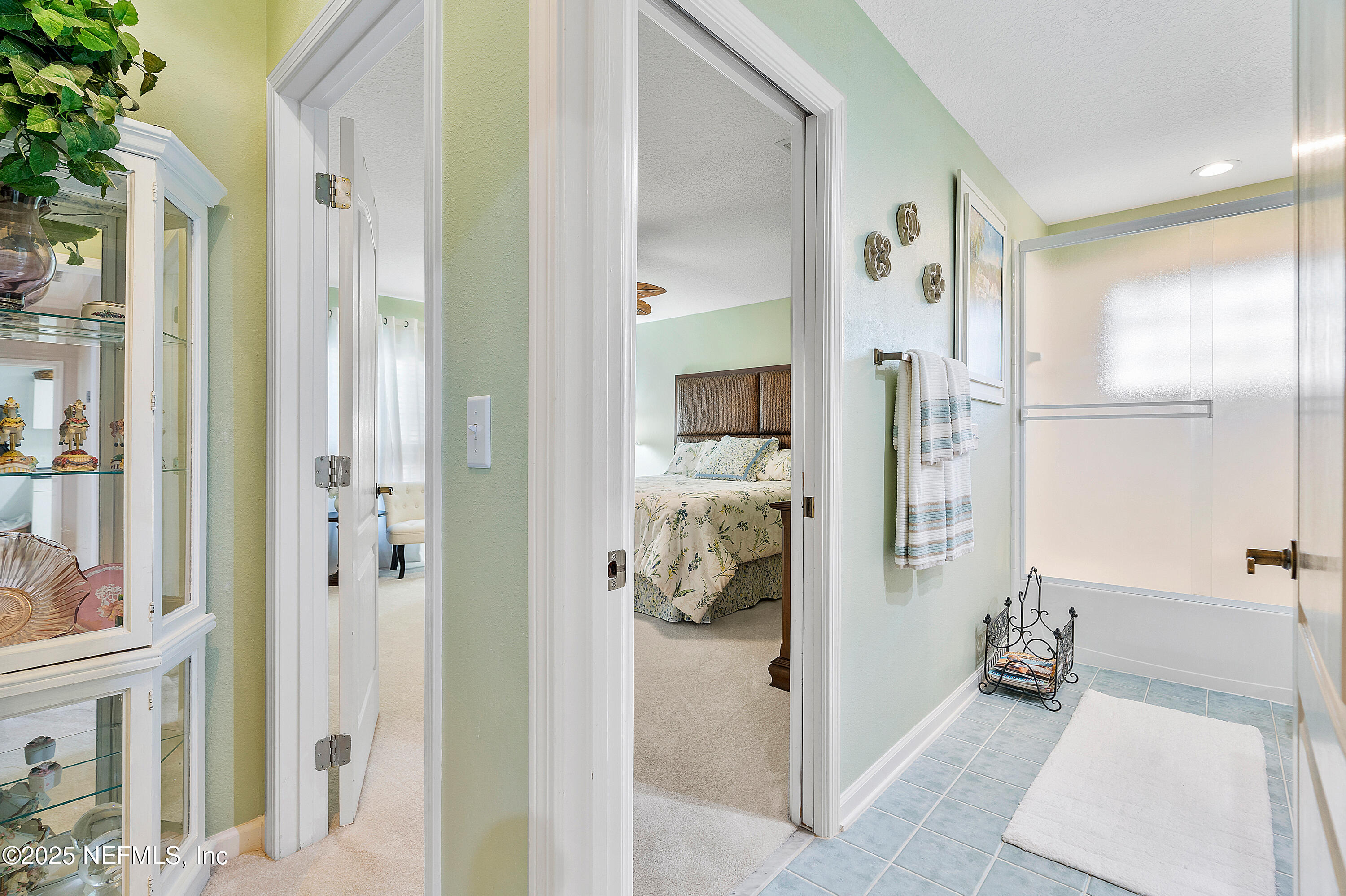 2688 Seneca Drive St. Johns, FL 32259 - Photo 26 of 62 a bathroom with a tub shower and a sink