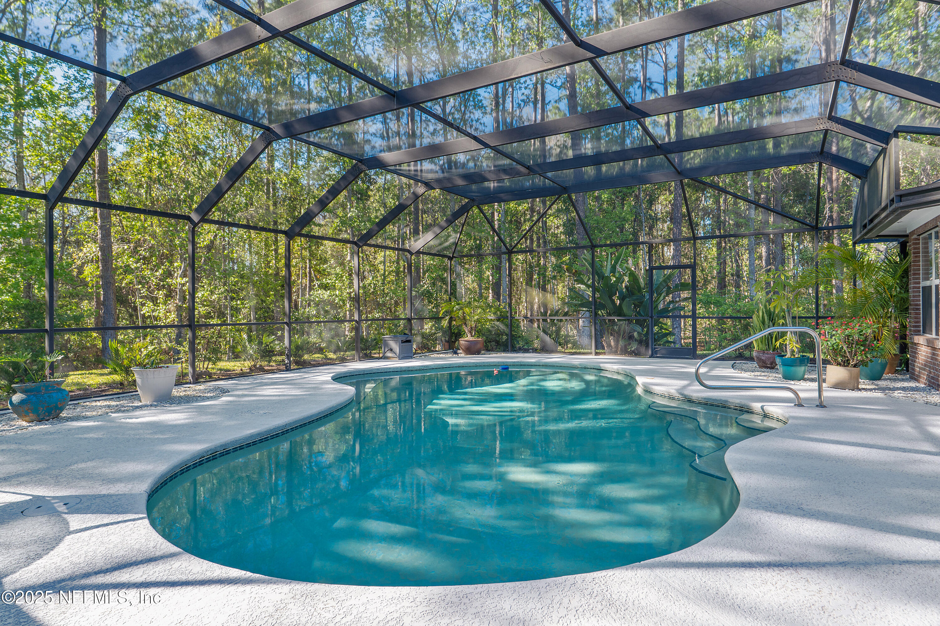 2688 Seneca Drive St. Johns, FL 32259 - Photo 3 of 62 a view of a swimming pool with a patio