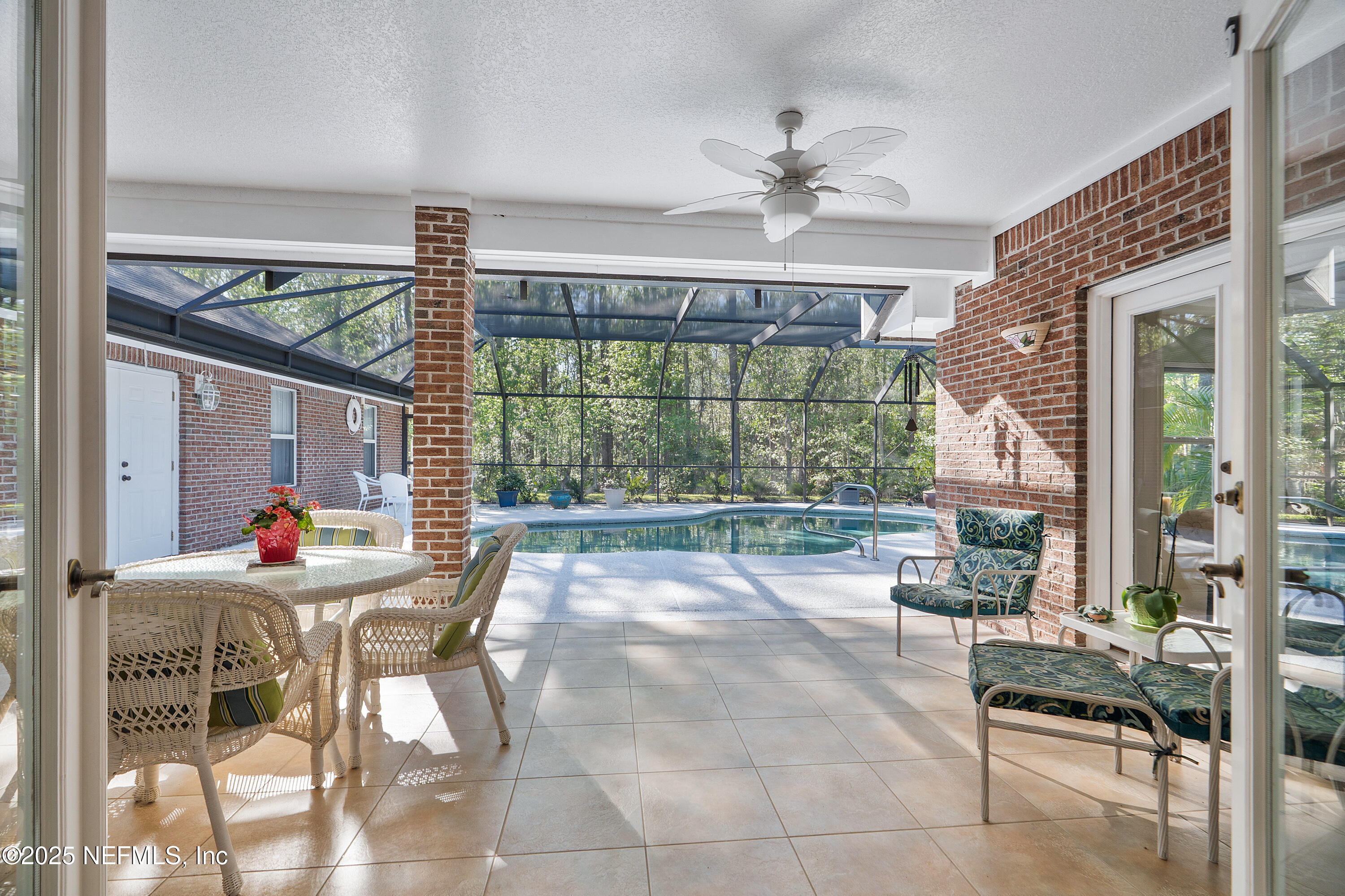 2688 Seneca Drive St. Johns, FL 32259 - Photo 35 of 62 a living room filled with furniture and a large window