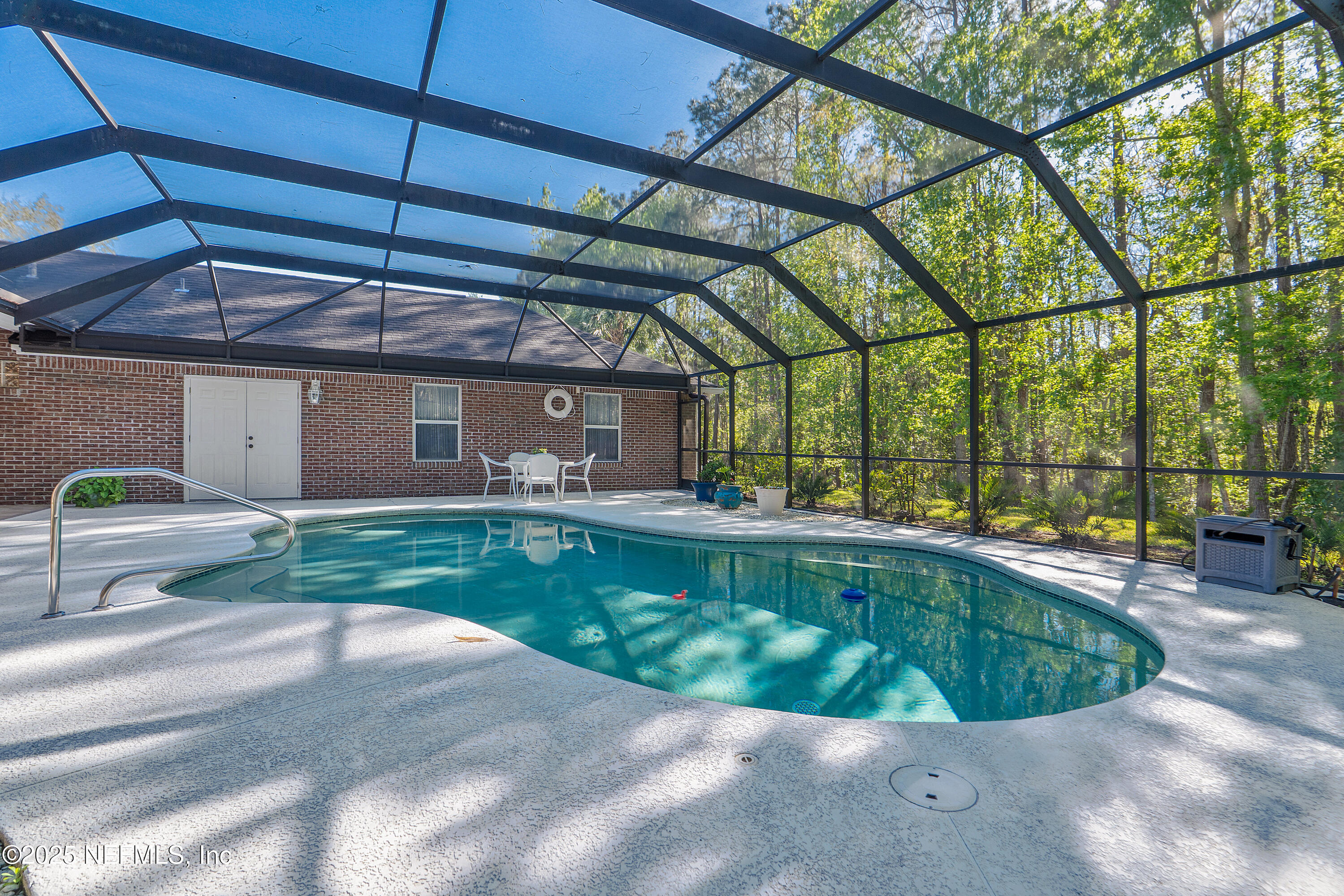 2688 Seneca Drive St. Johns, FL 32259 - Photo 39 of 62 a view of a backyard with a swimming pool