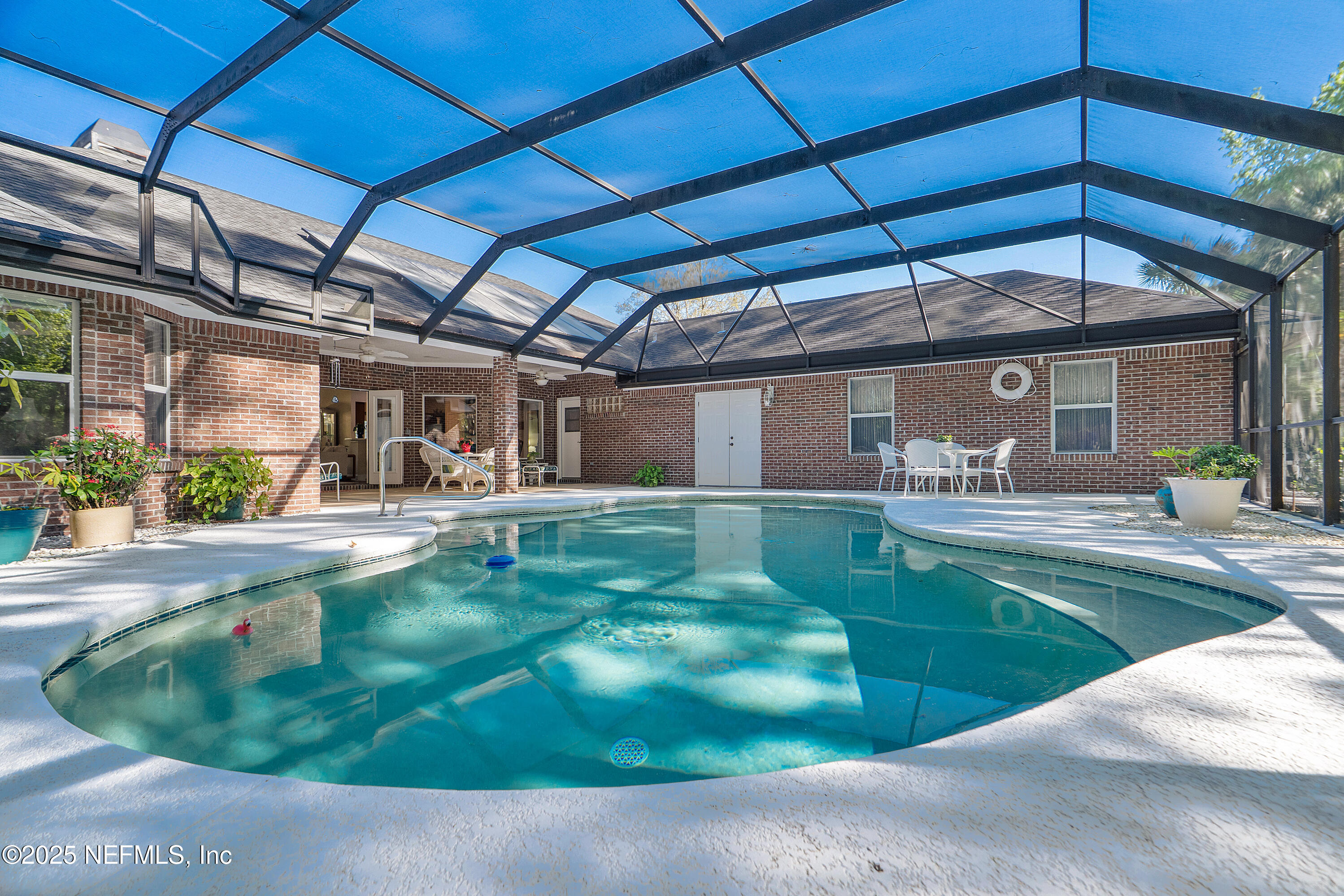 2688 Seneca Drive St. Johns, FL 32259 - Photo 41 of 62 a view of a backyard with a small swimming pool