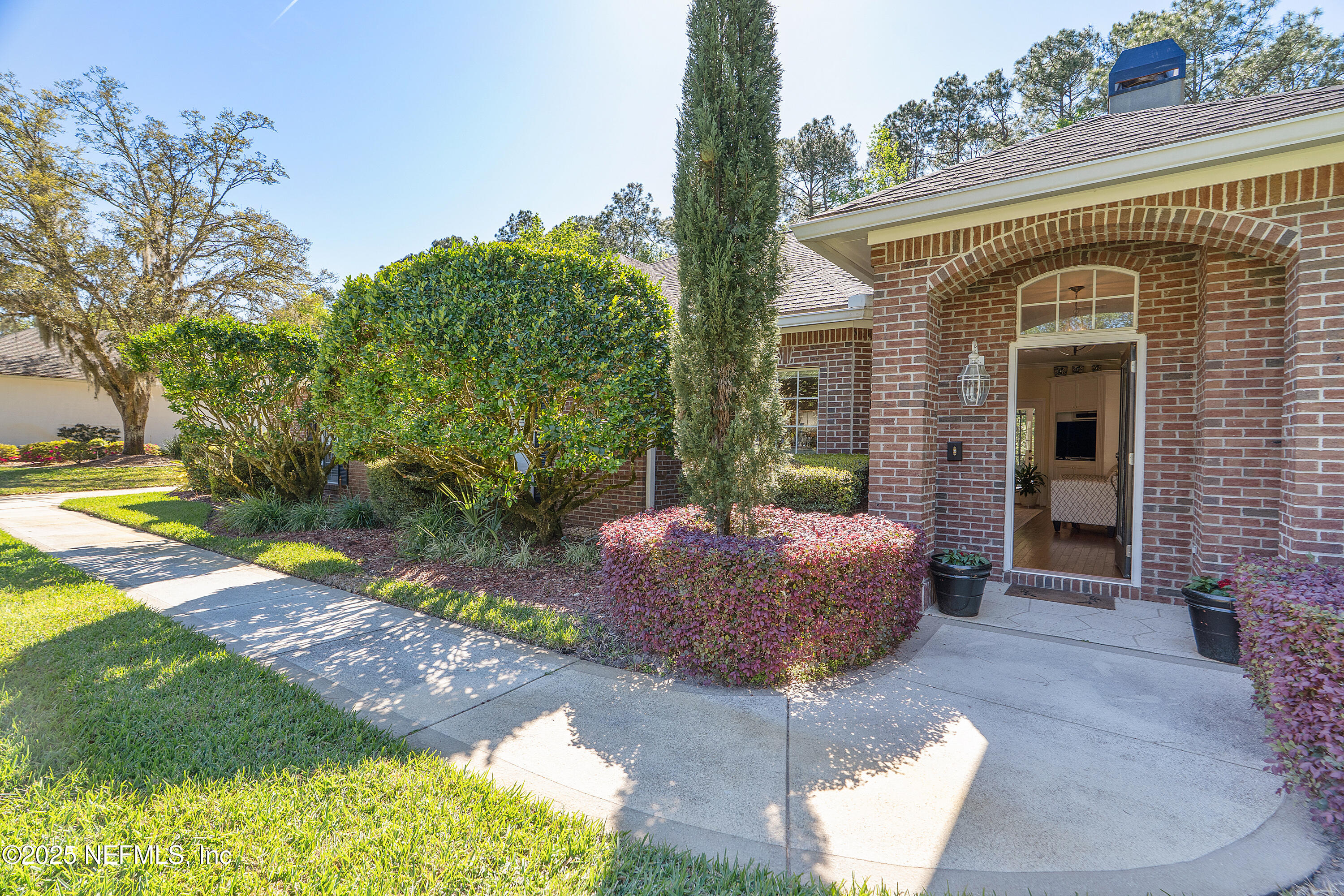2688 Seneca Drive St. Johns, FL 32259 - Photo 8 of 62 a front view of a house with garden