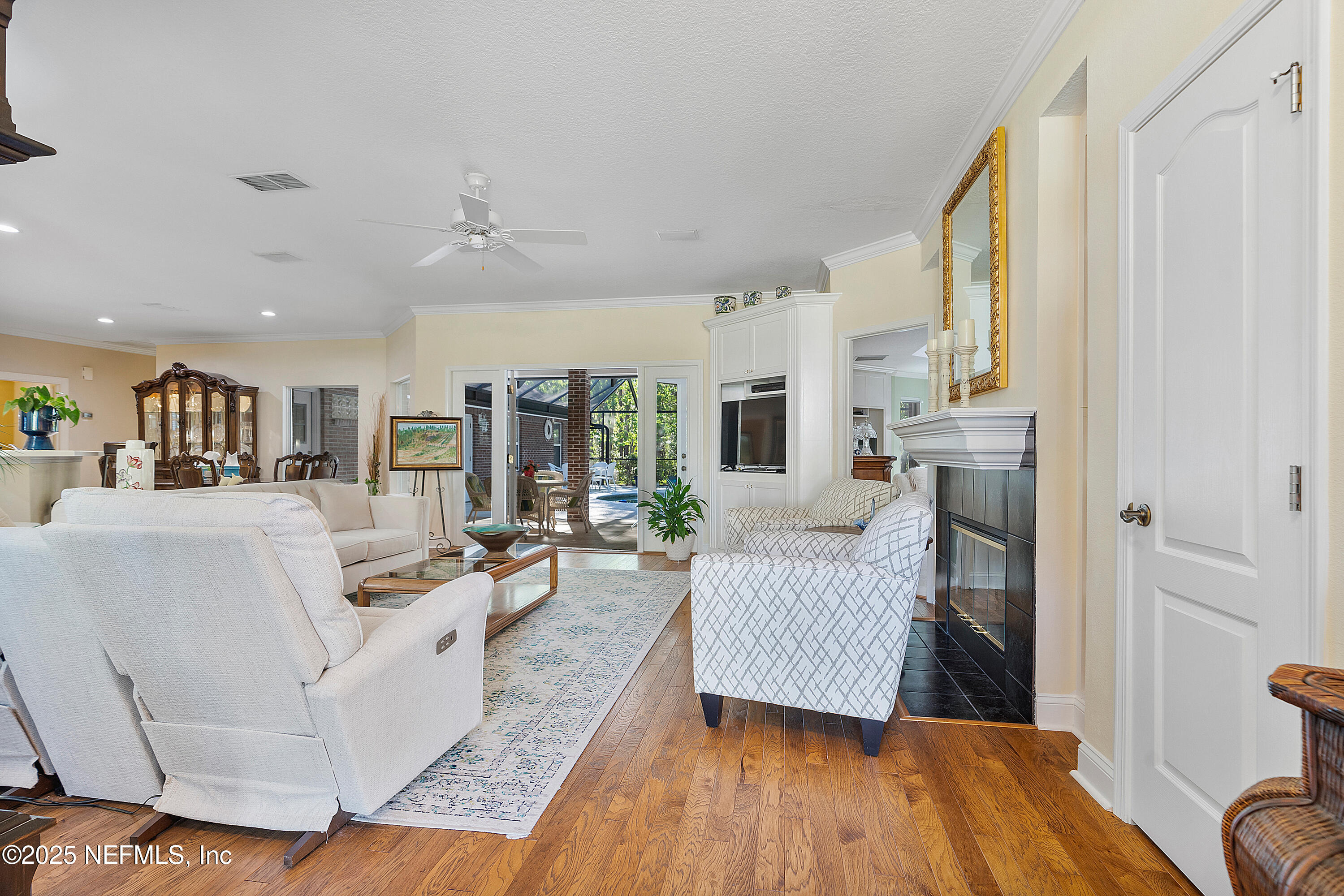 2688 Seneca Drive St. Johns, FL 32259 - Photo 10 of 62 a living room with furniture and a fireplace