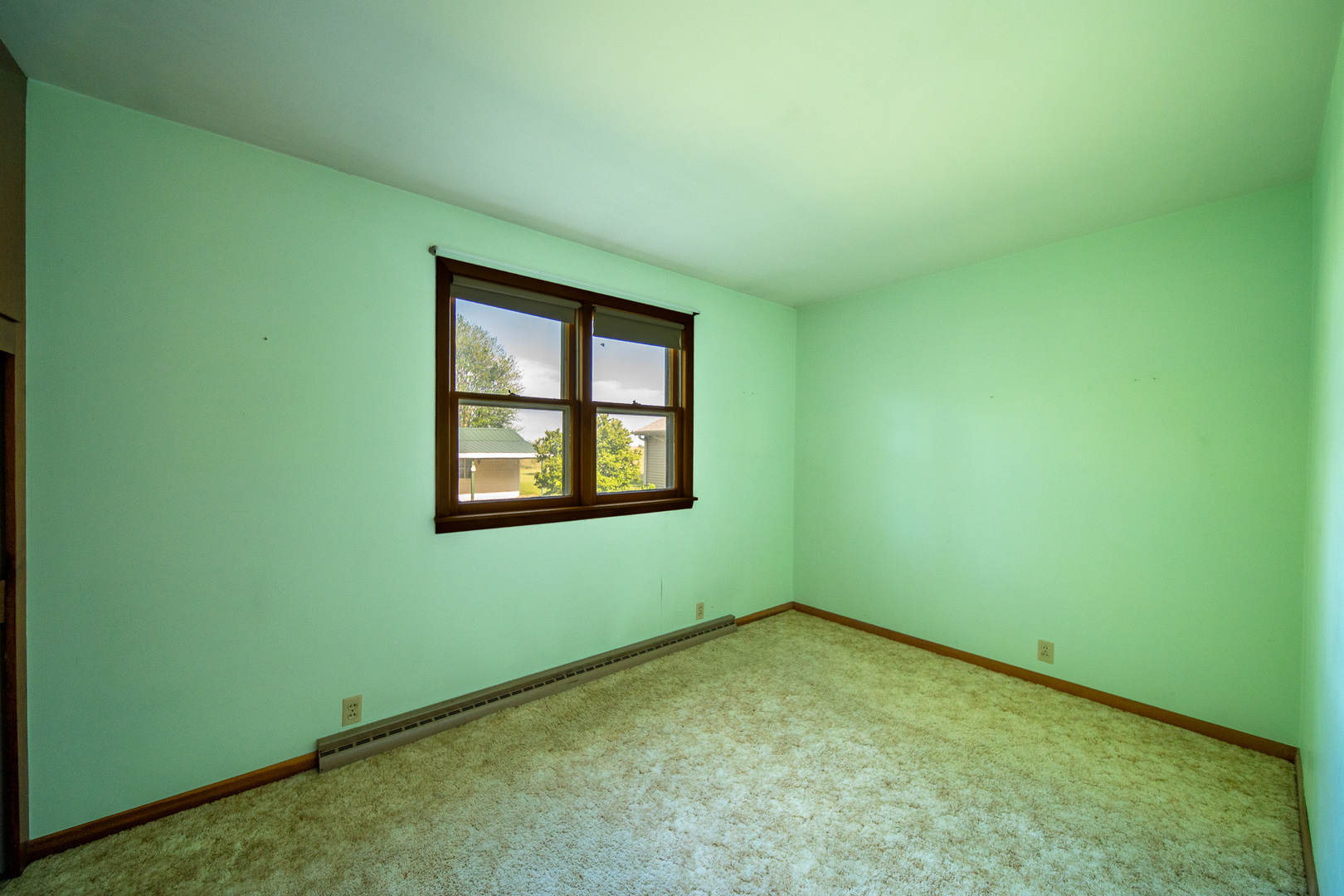 2056 Peek Home Road Dixon, IL 61021 - Photo 14 of 47 an empty room with windows