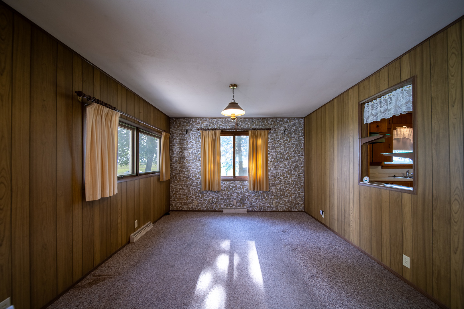 2056 Peek Home Road Dixon, IL 61021 - Photo 19 of 47 wooden floor in an empty room with a window