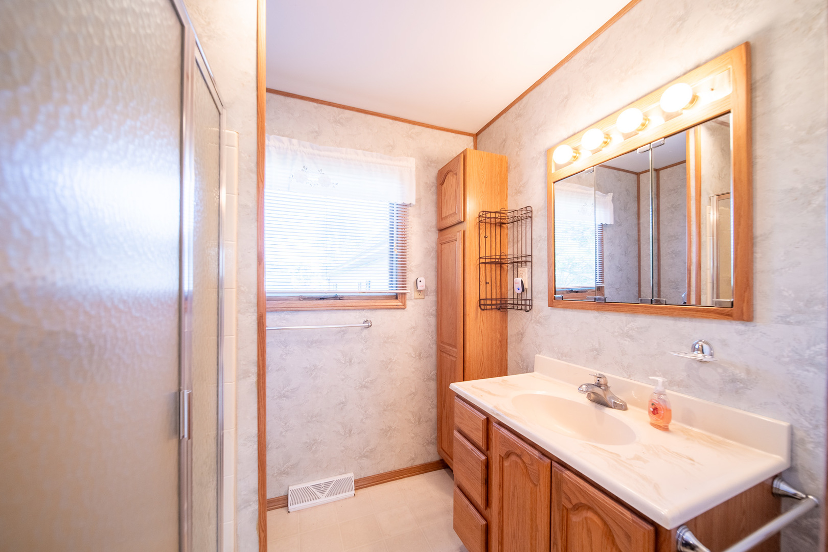 2056 Peek Home Road Dixon, IL 61021 - Photo 20 of 47 a bathroom with a sink and a mirror