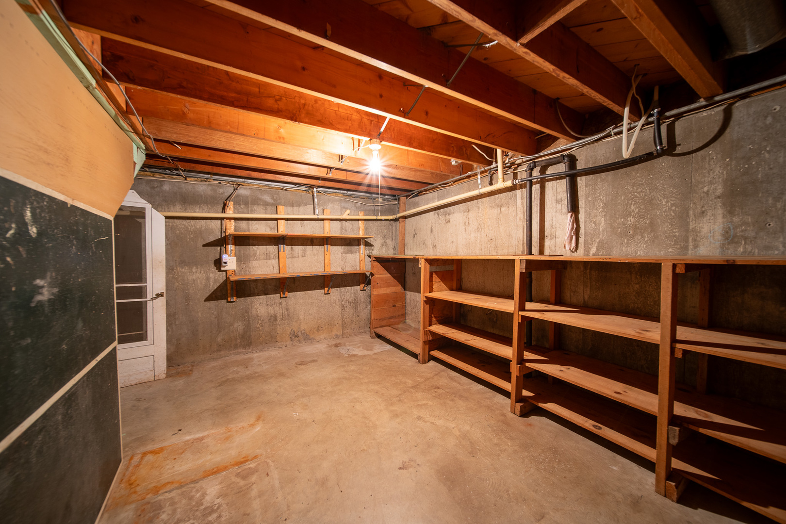 2056 Peek Home Road Dixon, IL 61021 - Photo 26 of 47 a view of an empty room with racks on the wall